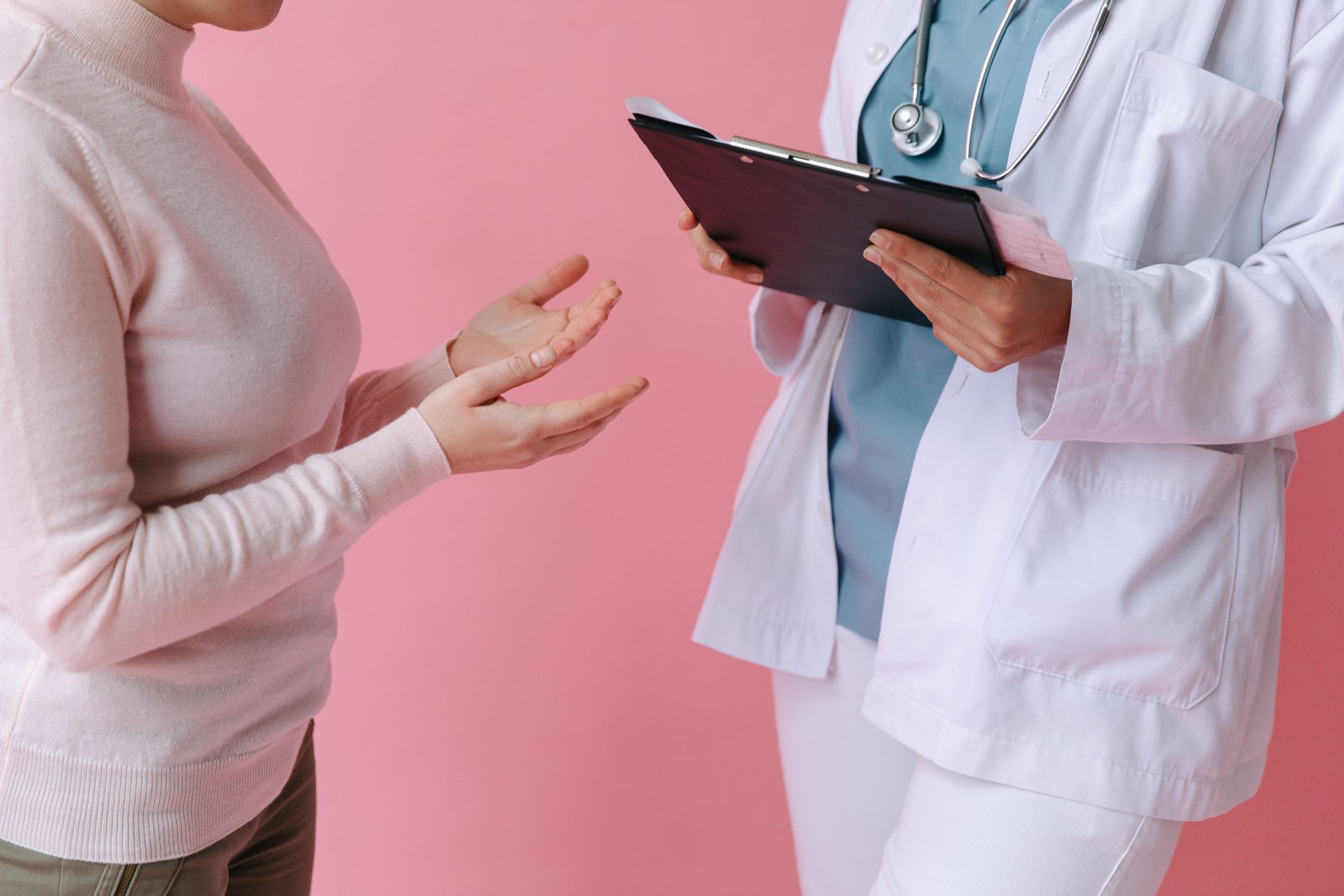 Doctor with patient in clinic