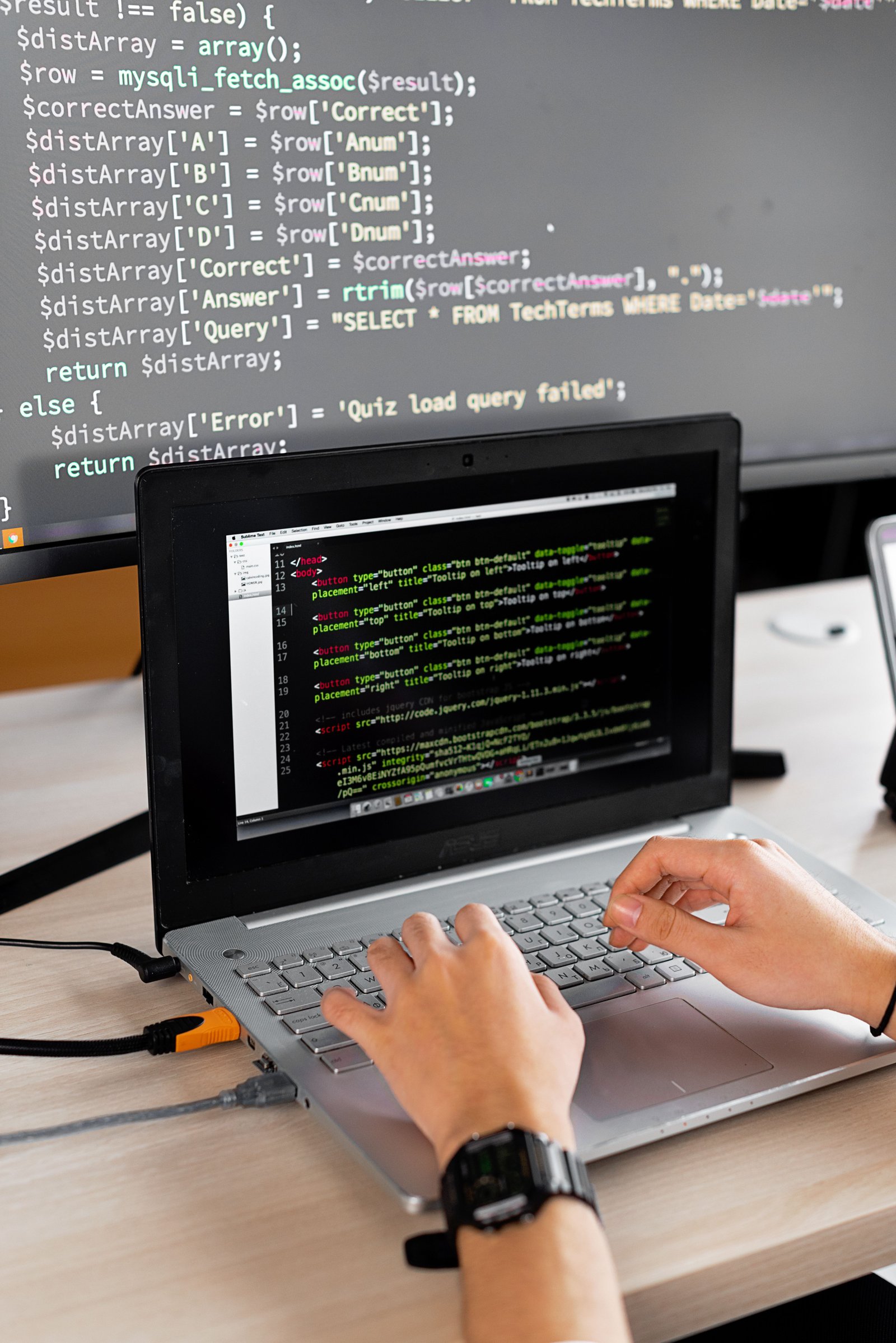 Developer coding and building the website
